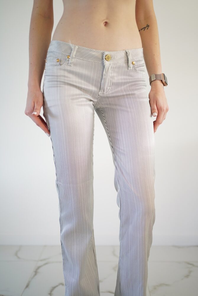 White trousers with black stripes