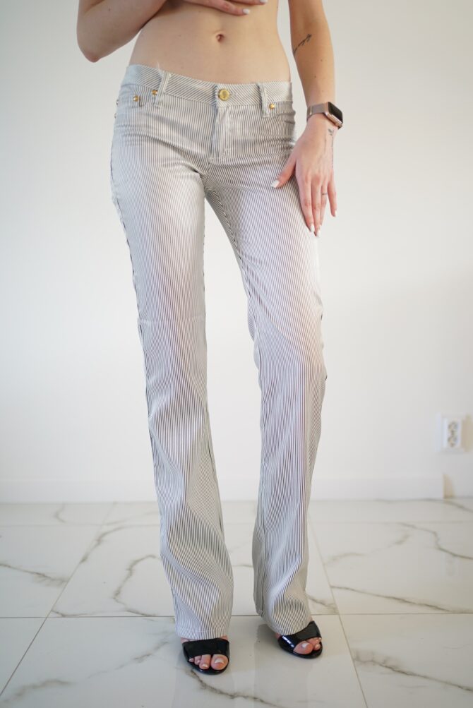 White trousers with black stripes