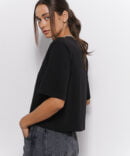 Women's black T-shirt with elongated sleeves