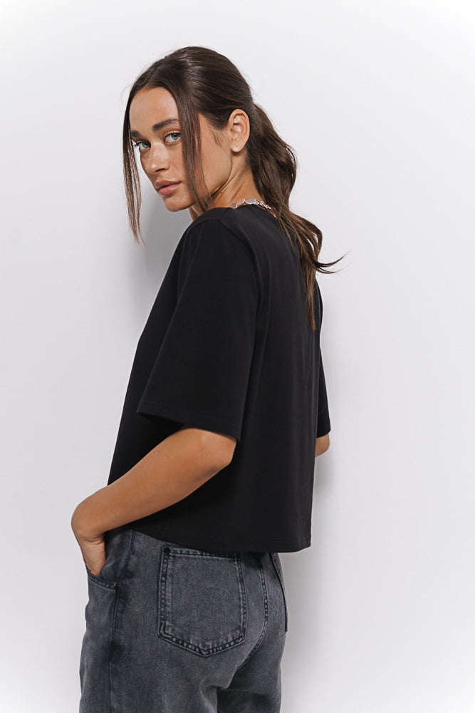 Women's black T-shirt with elongated sleeves