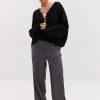Короткий в`язаний кардиган oversize на ґудзиках чорний