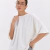 Жіноча oversize футболка молочного кольору