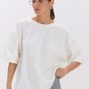 Жіноча oversize футболка молочного кольору