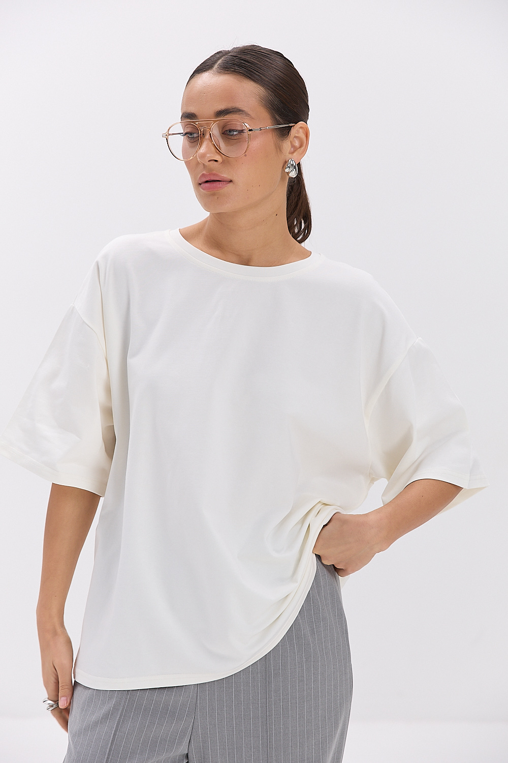 Жіноча oversize футболка молочного кольору