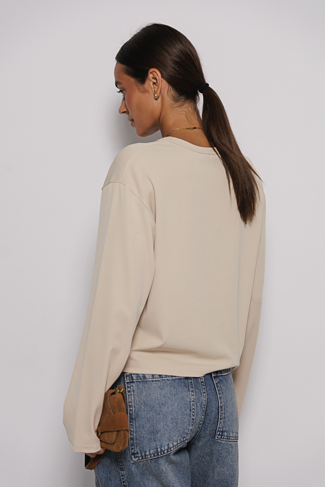 Жіночий лонгслів oversize в рубчик бежевий