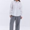 Жіноча сорочка oversize з батиста молочного кольору