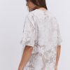 Жіноча футболка oversize бежева з ефектом Tie-Dye і розрізами з боків