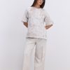 Жіноча футболка oversize бежева з ефектом Tie-Dye і розрізами з боків