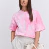 Жіноча футболка oversize рожева з ефектом Tie-Dye і розрізами з боків