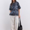 Жіноча футболка oversize чорна з ефектом Tie-Dye і розрізами з боків