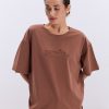 Жіноча футболка oversize коричнева з вишитим написом Nude