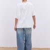 Жіноча футболка oversize молочна з вишитим написом Nude