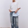 Жіноча футболка oversize молочна з вишитим написом Nude