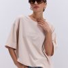 Жіноча футболка oversize світло-бежева з вишитим написом Nude