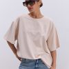 Жіноча футболка oversize світло-бежева з вишитим написом Nude