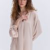 Блуза oversize бежева з рюшами внизу рукавів