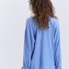 Блуза oversize блакитна з рюшами внизу рукавів