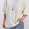 Жіноча oversize футболка кремового кольору