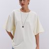 Жіноча oversize футболка кремового кольору