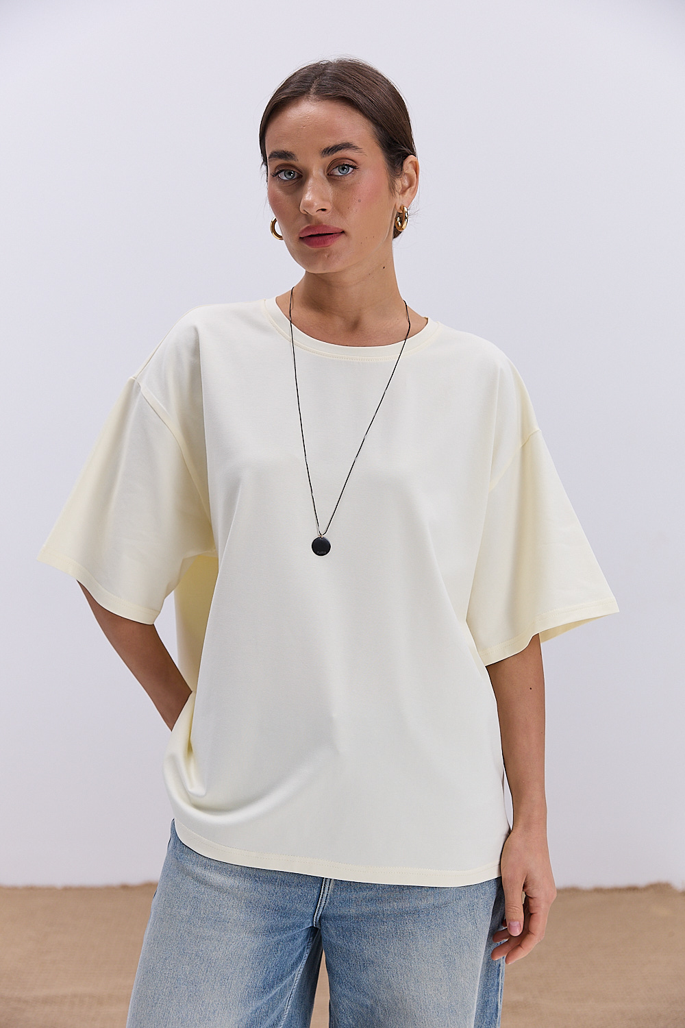 Жіноча oversize футболка кремового кольору