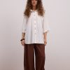 Жіноча лляна сорочка oversize молочна з короткими рукавами