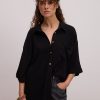 Жіноча лляна сорочка oversize чорна з короткими рукавами