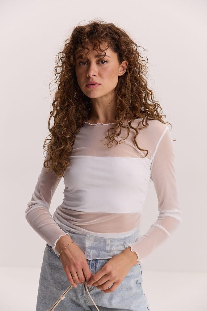 Жіночий кроп-топ з довгими рукавами молочний з сіточки зі вставкою