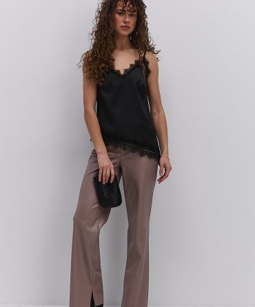 Жіночі шкіряні штани бежеві з розрізами внизу