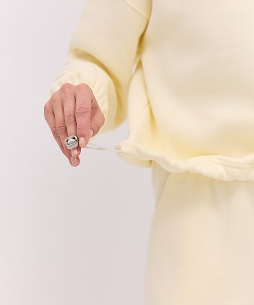 Жіночий спортивний костюм з теплого трикотажу кремовий