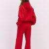 Жіночий спортивний костюм з теплого трикотажу червоний