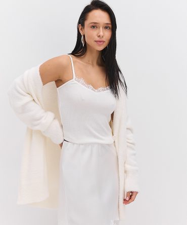 Атласна спідниця міні молочна з мереживом внизу