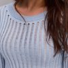 Ажурна в`язана кофтинка світло-блакитного кольору