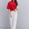 Жіноча oversize футболка червона з гумкою внизу